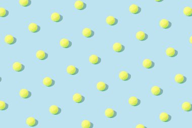 Sarı tenis toplarından yapılmış bir desen. Asgari konsept.