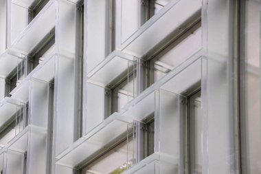 Architectural facade composed of glass parasols