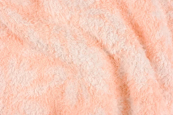 Drape the white and pink towels