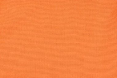 Against the background of orange fabric
