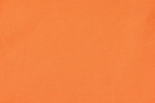 Against the background of orange fabric