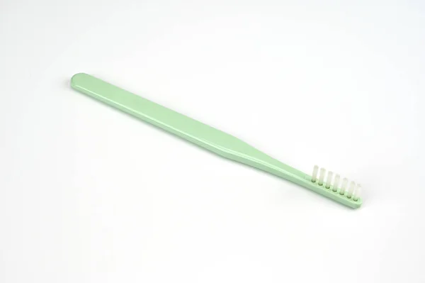 One Row Green Brushes Teeth — Stock Photo, Image