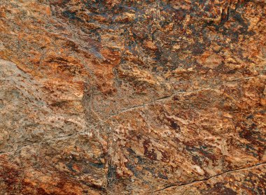 Doğal bir taşın arka planı. Taşın yüzeyi. 