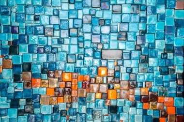 Farklı boyutlarda geometrik kare şekilli mavi-turuncu arkaplan.