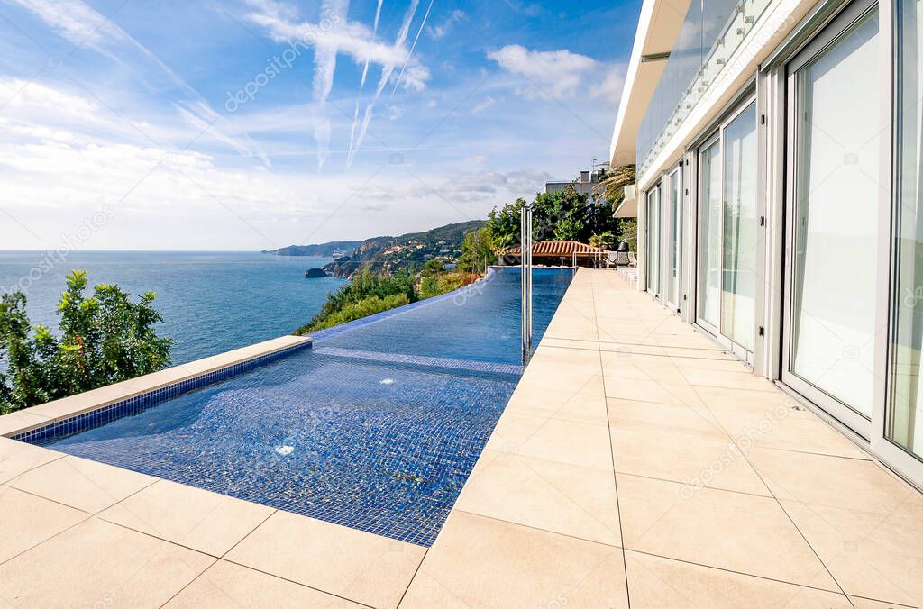 Luxury swimming pool with beautiful sea view.