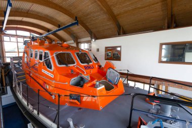 Editorial Swansea, UK - August 01, 2022:The RNLB Edward and Barbara Prigmore at the Mumbles lifeboat station on Mumbles Pier in Swansea, South Wales U