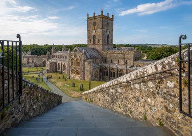 Editorial St Davids, UK - August 29, 2022: The steps and gates at St Davids Cathedral in St Davids, West Wales, the smallest city in the U