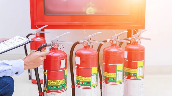 Engineer inspection Fire extinguisher and fire hose.