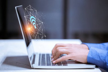 İş dünyası, dizüstü bilgisayar, wifi simgesi, iş iletişimi sosyal ağ kavramı.