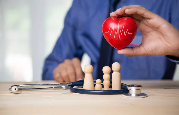 Red heart with stethoscope and family on white background, heart health, health family insurance concept.