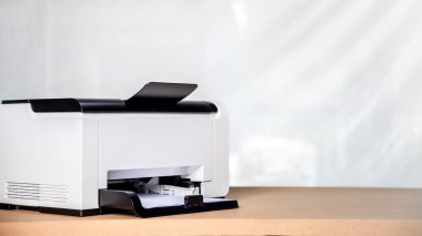 Printer, copier, scanner in office. Workplace ,photocopier machine for scanning document printing a sheet paper and xerox photocopy.
