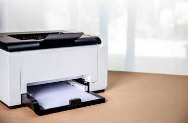 Printer, copier, scanner in office. Workplace ,photocopier machine for scanning document printing a sheet paper and xerox photocopy.