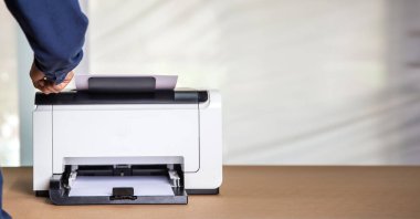 Printer, copier, scanner in office. Workplace ,photocopier machine for scanning document printing a sheet paper and xerox photocopy.