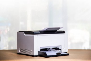 Printer, copier, scanner in office. Workplace ,photocopier machine for scanning document printing a sheet paper and xerox photocopy.