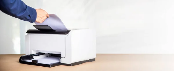 Printer, copier, scanner in office. Workplace ,photocopier machine for scanning document printing a sheet paper and xerox photocopy.