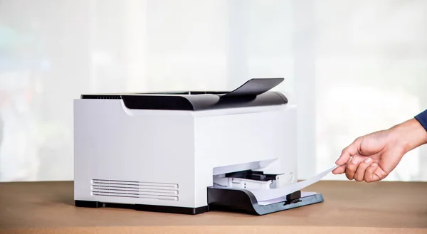 Printer, copier, scanner in office. Workplace ,photocopier machine for scanning document printing a sheet paper and xerox photocopy.