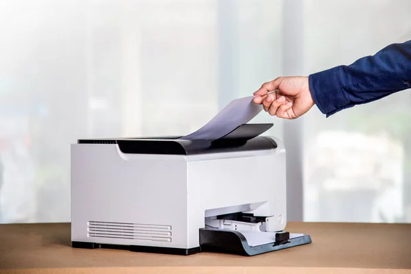 Printer, copier, scanner in office. Workplace ,photocopier machine for scanning document printing a sheet paper and xerox photocopy.