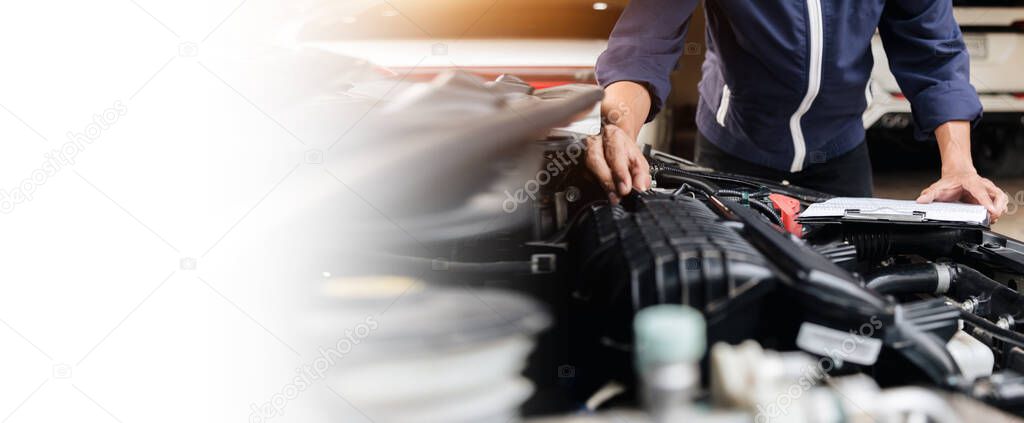 Automobile mechanic repairman hands repairing a car engine automotive workshop with a wrench, car service and maintenance, Repair service.