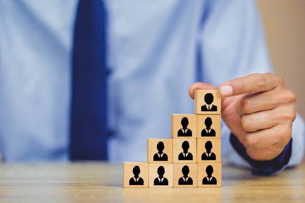 Hand business human resource, recruitment employee and Talent management with Successful business team leader concept