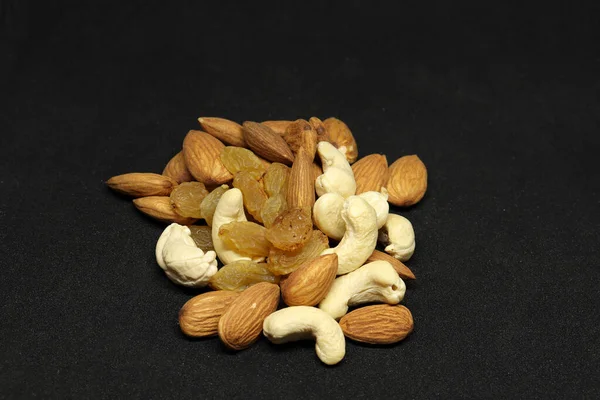 Healthy Dry Fruit Almond Cashews Grapes Black Background — 스톡 사진