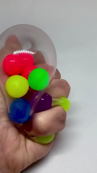 Brinquedo macio antistress com bolas coloridas — Vídeo de Stock