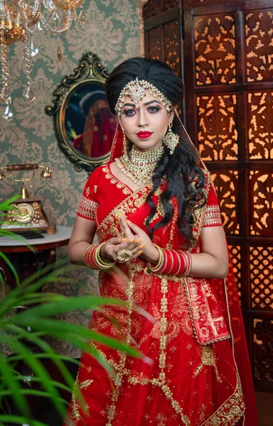 Beautiful Non Bengali Bride Red Lehenga Choli Gorgeous Looking Makeup ストック写真