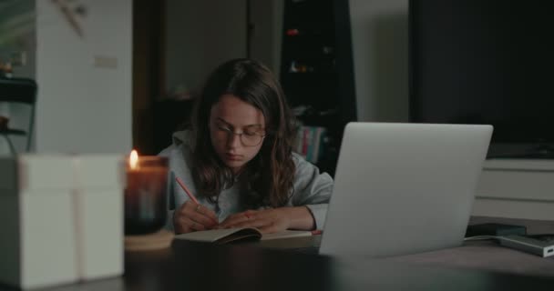 Millennial woman at home work on project or study — Video