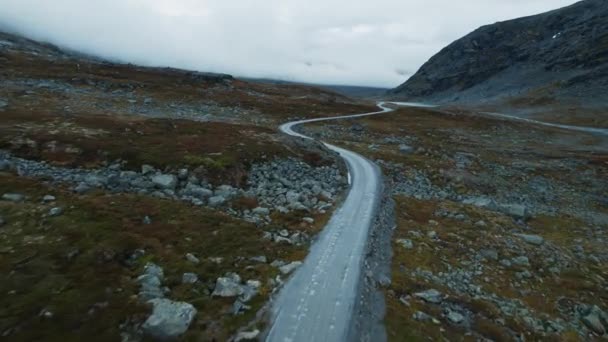 Epic aerial drone view on empty road in Norway — стоковое видео