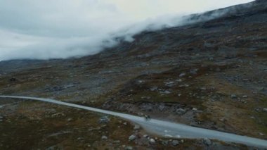 Aerial drone shot of cyclists compete in speed