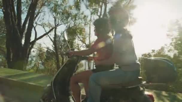 Two Female Friends Ride Moped Spanish Countryside Italian Vacation Summer – Stock-video