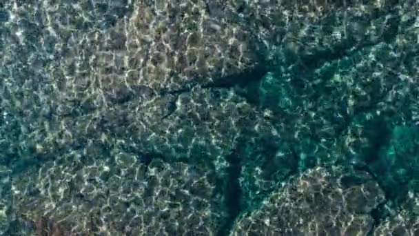 Top Aerial Drone View Shimmering Crystal Clear Turquoise Water Rock — Stockvideo