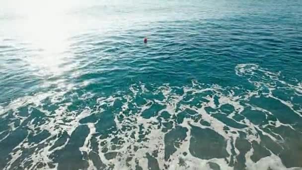 Little Red Buoy Floats Waving Blue Ocean Water Early Morning — Vídeo de stock