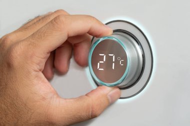 Limiting the air conditioning temperature to 27 degrees. Saving energy. Restricting and limiting the use of electricity due to gas shortages