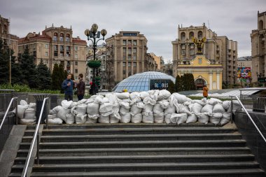 KYIV, UKRAINE - APR 20, 2022: Barricades of sandbags block the underpasses Independence Square in the event of an attack by enemy Russian troops. clipart