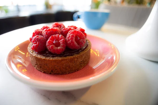 tartlet with raspberry and cocoa-nut paste