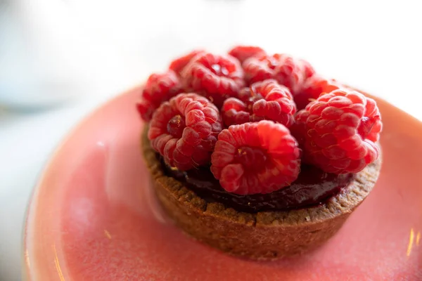 tartlet with raspberry and cocoa-nut paste