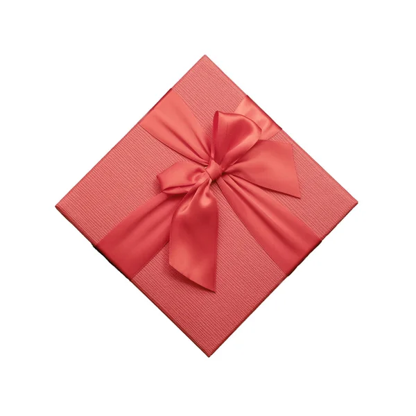 Rode doos met een strik op een geïsoleerde achtergrond. Bovenaanzicht. Vakantie geschenk — Stockfoto