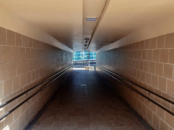 Underpass tunnel. Light at the end of underpass tunnel