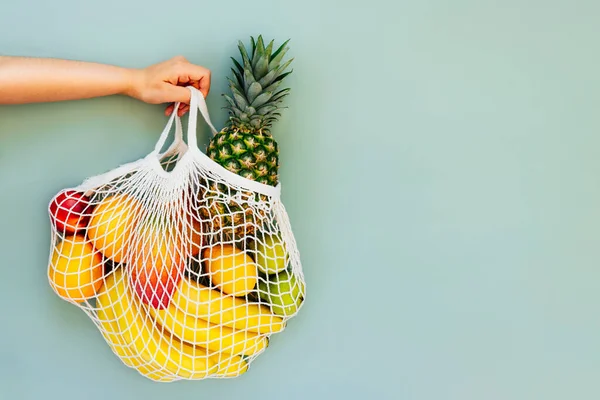 Top View Female Hand Holding String Bag Mesh Bag Grocery — Stockfoto