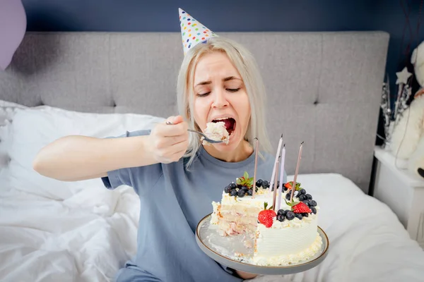 Sad Upset Woman Pajama Party Cap Eating Spoon Her Birthday — Stock Photo, Image