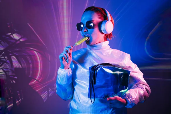 Portrait Cyberpunk Girl Sunglasses Headphones Neon Light Futuristic Woman Licking — ストック写真