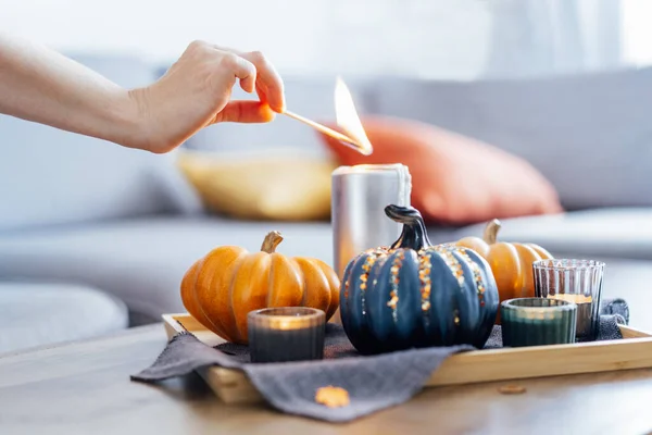Female Hand Lighting Candle Match Autumn Cozy Composition Hygge Home — Stok fotoğraf