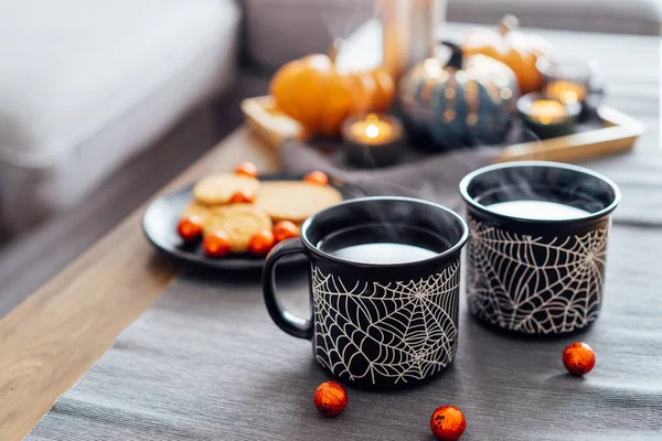 Cozy Halloween Plans Home Hot Tea Drink Black Mugs Spider — Zdjęcie stockowe