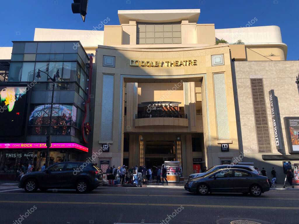 LOS ANGELES, Nov 10th, 2018: Wide shot people walking past the entrance to the Dolby Theatre, home of the Oscars, at the Hollywood and Highland shopping mall on Hollywood Boulevard Walk of Fame. High