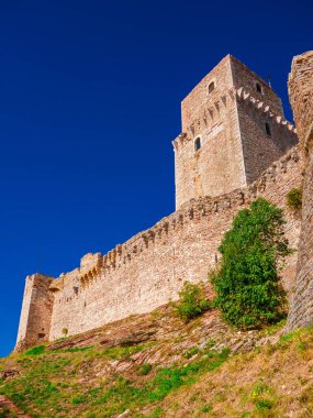 Assisi, ITALY, OCTOBER 23, 2019 - View of Rocca Maggiore (Great Fortress) ancient ruins, at the top of the medieval city of Assisi