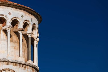 Romanesque architecture in Lucca. City Cathedral apse view, completed in the 14th century (with blue sky and copy space)