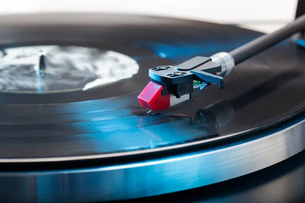 Close-up of a vintage hifi stereo turntable with the needle on a lp