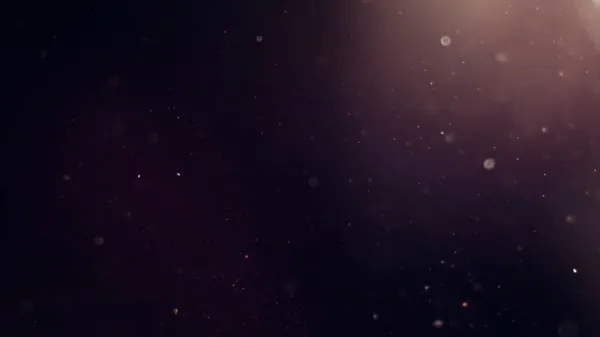 Doğal yüzen toz parçacıklarının arka planı mercek alevleriyle aydınlatılıyor