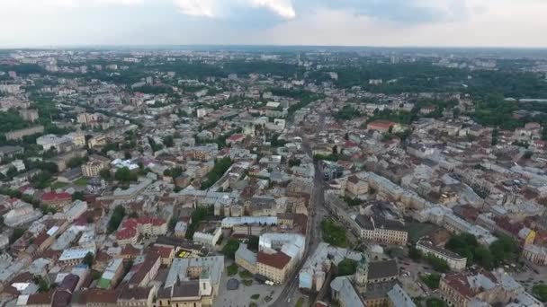 View from the drone to Lviv. Rynok Square area. Aerial panorama of the city in the evening. — Stock Video