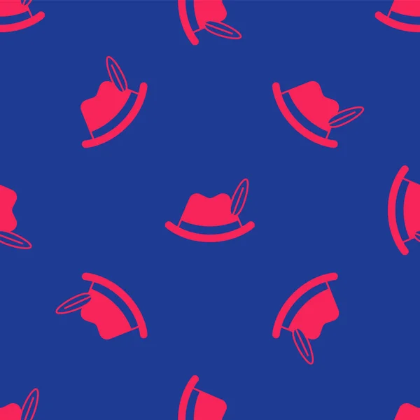 Red Oktoberfest klobouk ikona izolované bezešvé vzor na modrém pozadí. Lovecký klobouk s peřím. Německý klobouk. Vektor — Stockový vektor